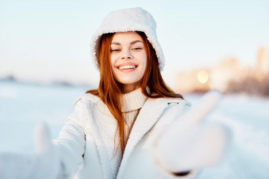 woman smile Winter mood walk white coat nature