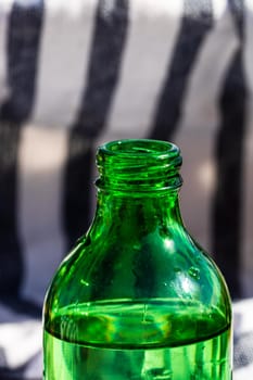 Detail of water glass bottle. Water drinking concept