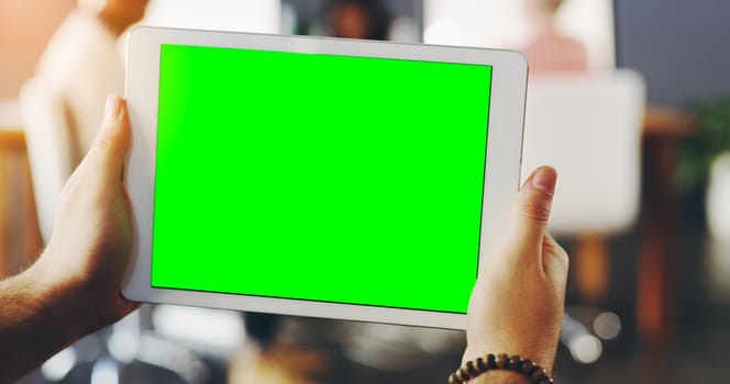 Take a browse. Shot of an unrecognisable businessperson holding a digital tablet with a chroma key screen.