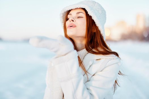 young woman smile Winter mood walk white coat Lifestyle