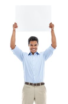 How do you like this idea. Studio shot of a young man holding a blank card for copyspace isolated on white.