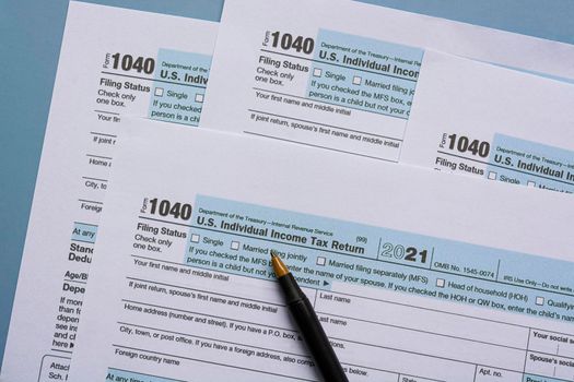 Tax forms 1040. U.S Individual Income Tax Return on a desk. Tax concept.