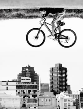 The sky is the limit. A man on a bicycle hovers in the air over the rooftops of a city - perception.