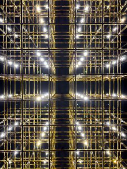 Abstract gold grid with backlight, vivid perspective symmetrical image, art deco pattern