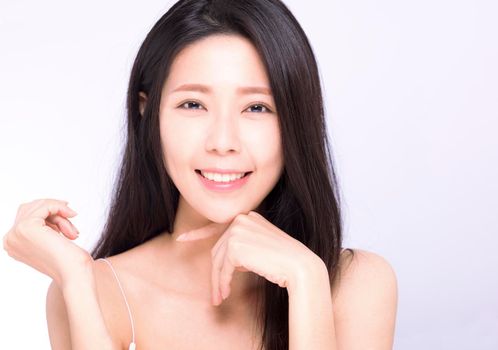 Beautiful Young asian Woman face with Clean Fresh Skin