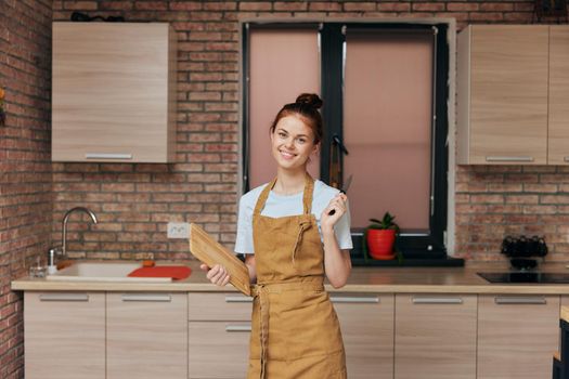 woman kitchen apartment kitchen cutting board utensils interior home life