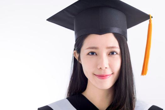 Closeup Young Asian Woman Students wearing Graduation hat and gown