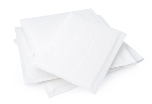 Stack of envelopes on white background