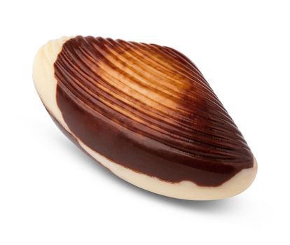 Chocolate sweets shaped as seashells isolated on white background
