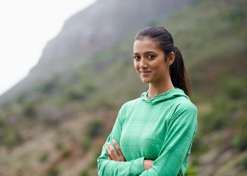 She loves extreme hiking. Portrait of an attractive young woman enjoying a day outdoors.