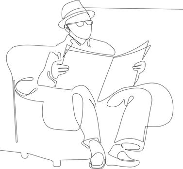 Relaxed senior gentleman reading a newspaper