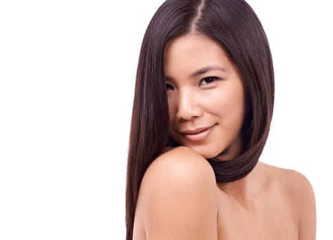Naturally gorgeous. Cropped shot of a beautiful young oriental woman against a white background.