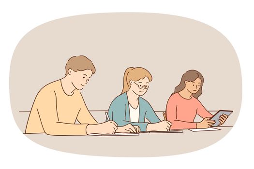 Young diverse people sit at desk study together in college or university. Male and female students engaged in education process in high school write in notebook. Learner concept. Vector illustration.