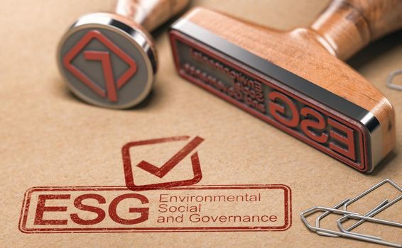 ESG, Environmental, Social and Governance printed in blue with two rubber stamps over brown paper. Corporate responsibility concept.