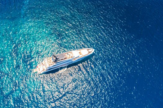 Superyacht aerial view on open sea