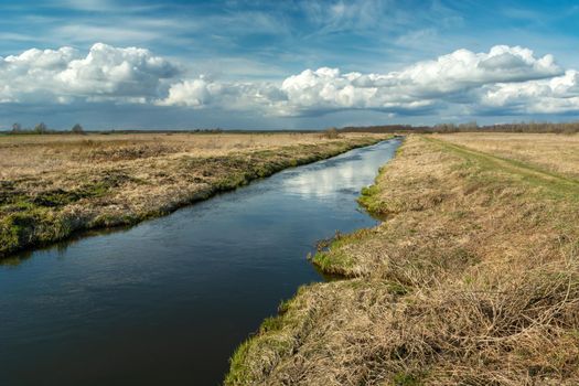 A small river that flows through the meadows