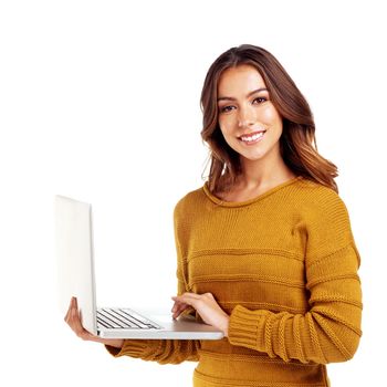Blogging can help you in so many ways. Studio shot of a young woman holding her laptop against a white background.