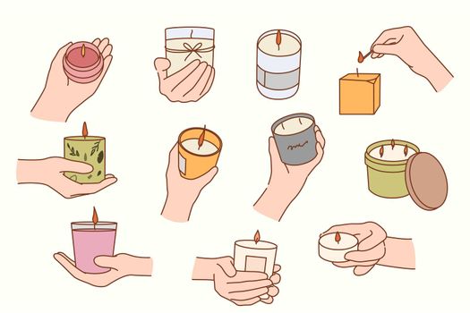 Set of people hold scented oil candles