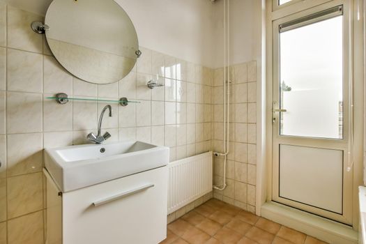 A small, old-fashioned bathroom