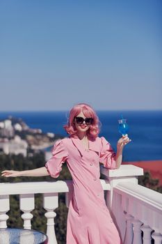 attractive woman pink hair sunglasses leisure luxury vintage unaltered