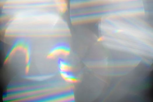 Rainbow Lens. Optical glare effect of objective lenses. Defocused blur reflection of rainbow sunbeams.