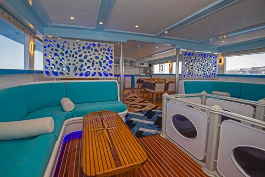 Interior design of large salon area on luxury motor yacht