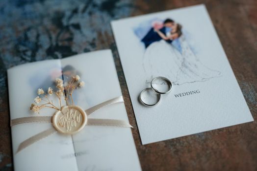 gold wedding rings with a invitation wedding