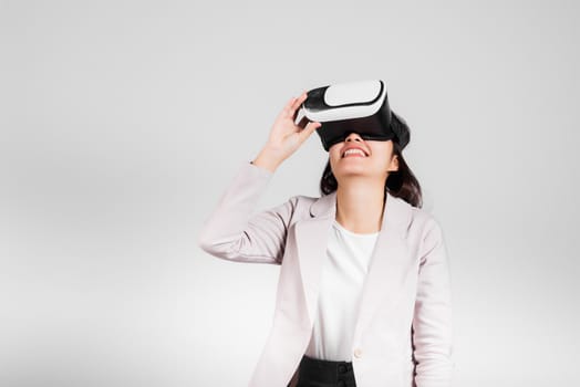 Smiling woman confidence excited wear VR headset device during virtual reality experience