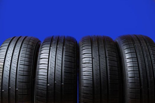 Group of tires on a blue background