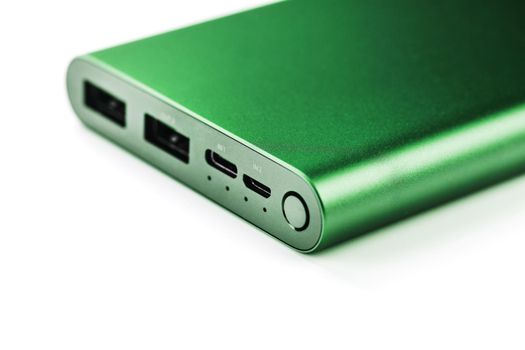 Green Power Bank on a white background for charging mobile devices