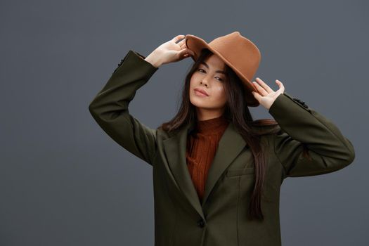 young woman jacket hat elegant style fashion isolated background. High quality photo