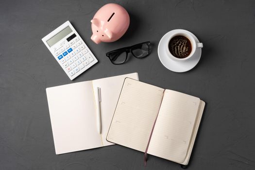 Office desk with notepad, glasses and supplies