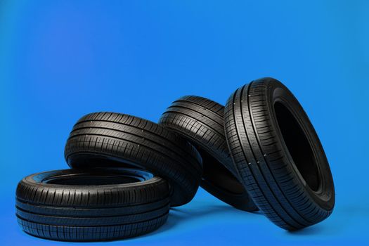 Group of tires on a blue background