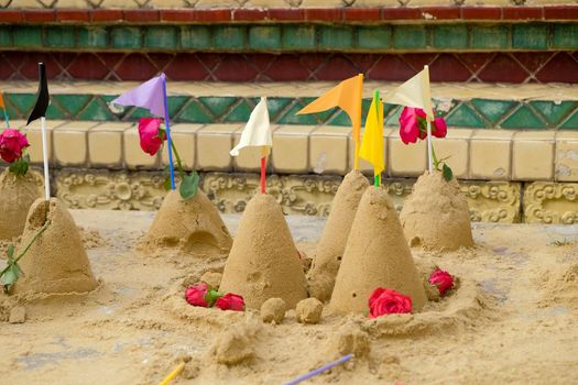 Group of sand pagoda on temple in Songkran tradition on Thailand