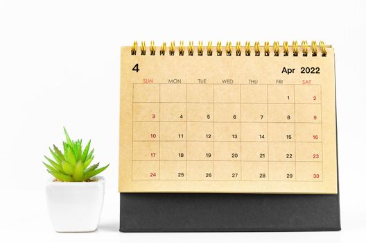 April 2022 desk calendar on white background.