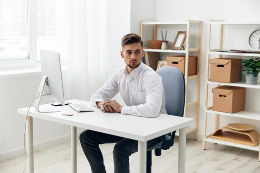 handsome businessman office worker in a white shirt workplace