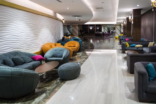 a variety of modern style sofas in the lobby of a Turkish hotel