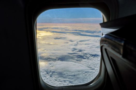 aerial view of blue sky with clouds from window jet flight