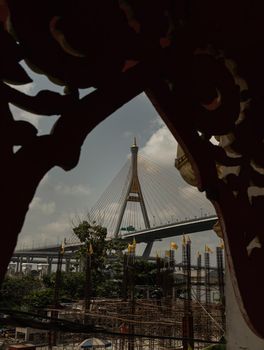 Bangkok, thailand - 12 Mar, 2021 : Bhumibol suspension bridge cross over Chao Phraya River at afternoon. Is one of the most beautiful bridges in Thailand. Selective focus.