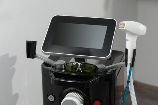 Modern equipment for laser hair removal in a beauty salon. Beauty salon and cosmetology