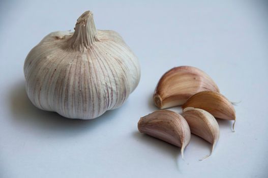 Close-up of garlic on white background. Healthy food concept