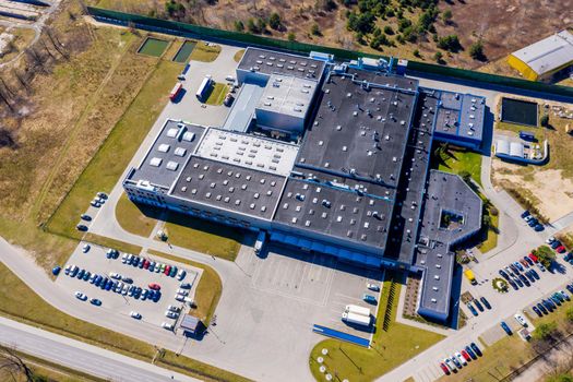Distribution logistics building parking lot - aerial view 