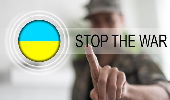 Man pressing virtual button with flag icon. stop war virtual button