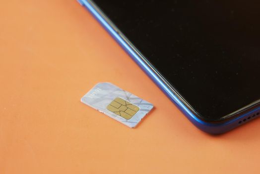 A sim card for a smart phone on table