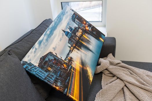 Canvas prints. Photo printed on canvas with gallery wrapping on stretcher bar. photo stacked on sofa. Colorful photography