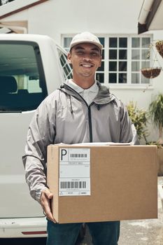 Loyalty is a brand. Shot of a young man delivering a package to a customer at home.