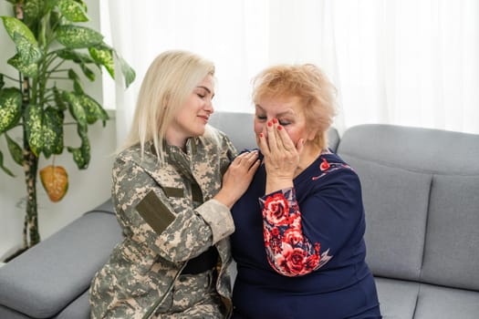Soldier woman reunited with her mother