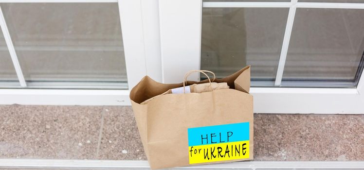 Humanitarian aid in Ukraine. Help to the poor. packages to pensioners and people with disabilities. war between Ukraine and Russia. Humanitarian aid concept. Donate for refugees.