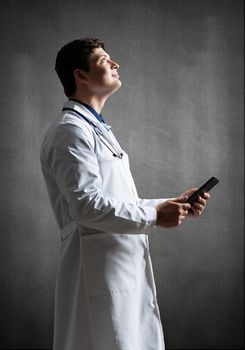 Doctor with a computer tablet
