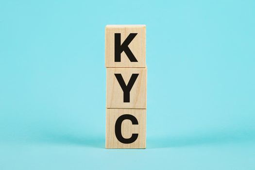 KYC - Know Your Customer. Wooden blocks with text KYC. You can use in business, finance , marketing and other concepts. Business photo showcasing Marketing creating a poll improve product or brand
